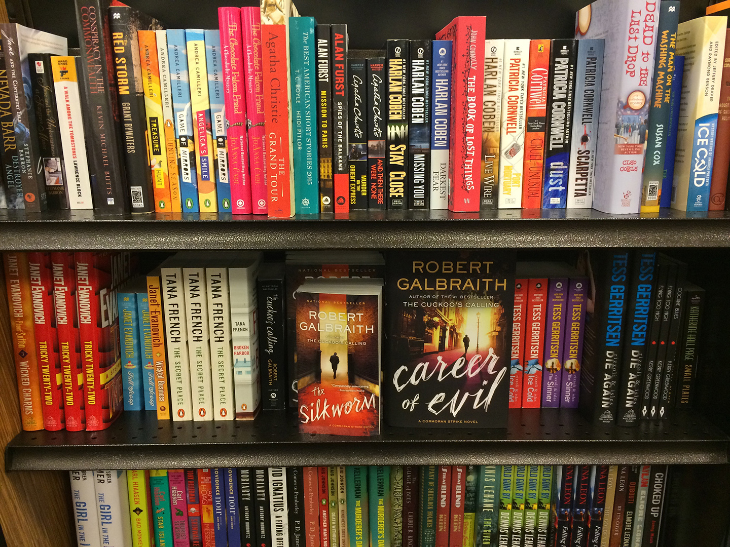 shelf of popular fiction books in emerson bookstore