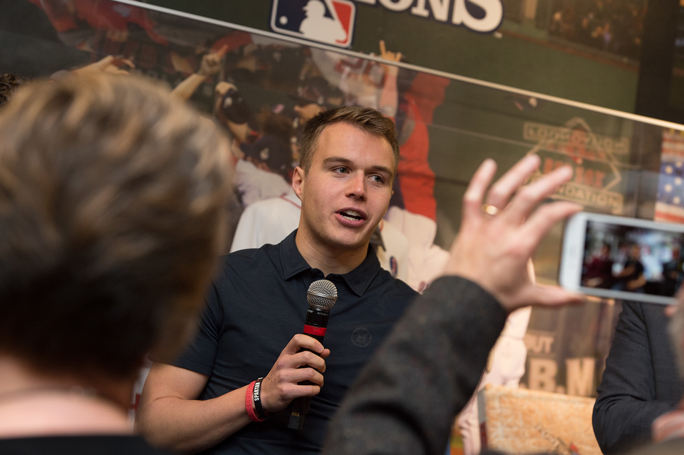 student speaks at sports communication program launch event at fenway park
