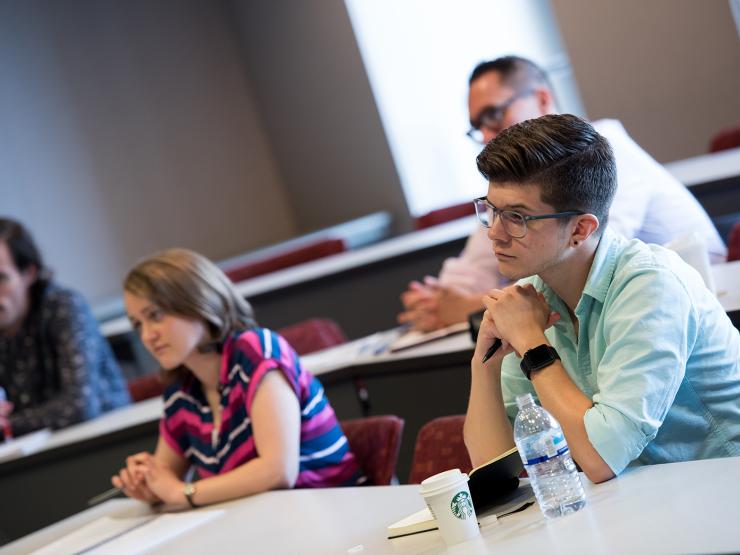 Students paying attention intently during lecture