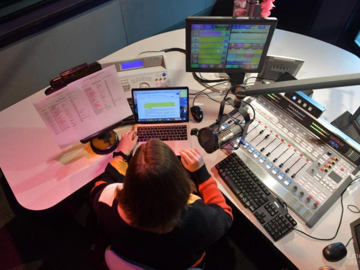 Overhead image of person in control booth