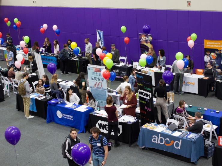 Overhead shot of students and employers at the Internship Fair