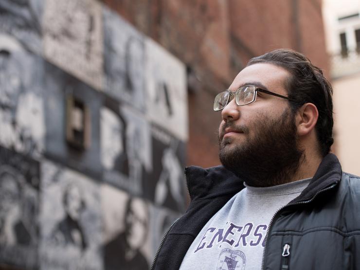 Student outside Brattle Book Shop