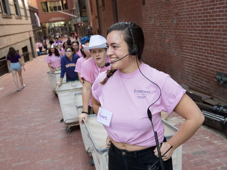 Student with headset at Move-In Day