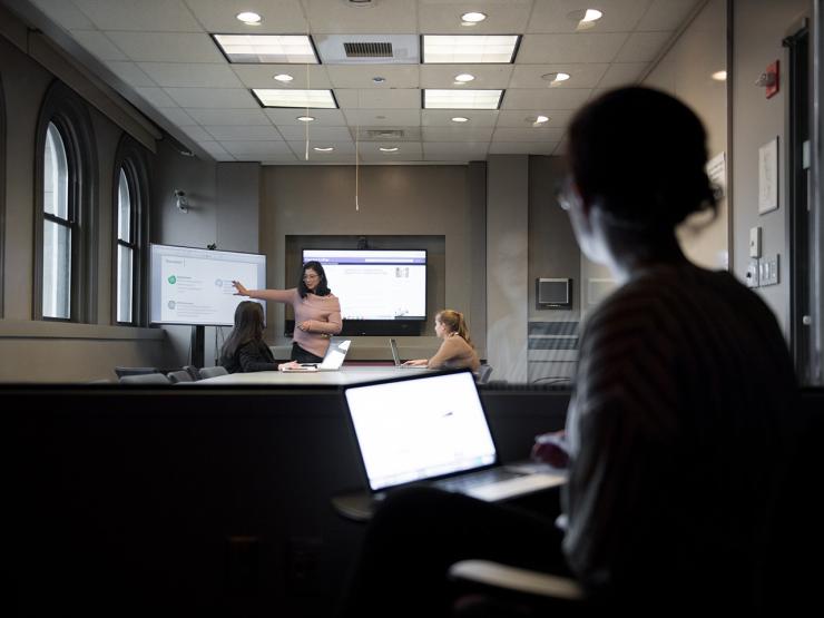 marketing communications students using focus room