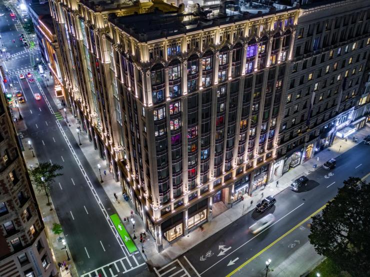 Emerson College's Little Building on Boylston Street, illuminated at night