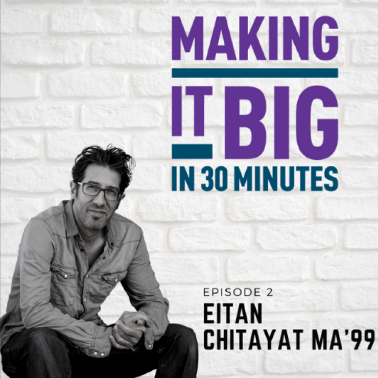 Eitan Chitayat posing next to the "Making It Big" logo