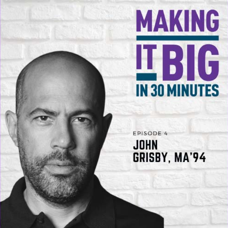 John Grisby in front of the "making it big" logo