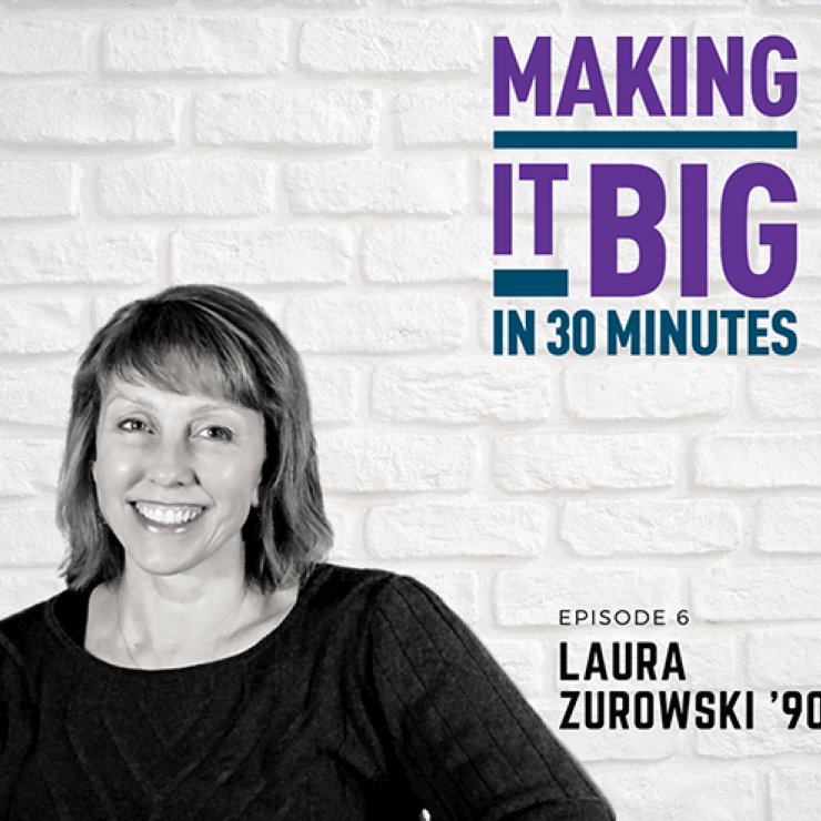 Artist Laura Zurowski posing next to the "Making It Big" logo