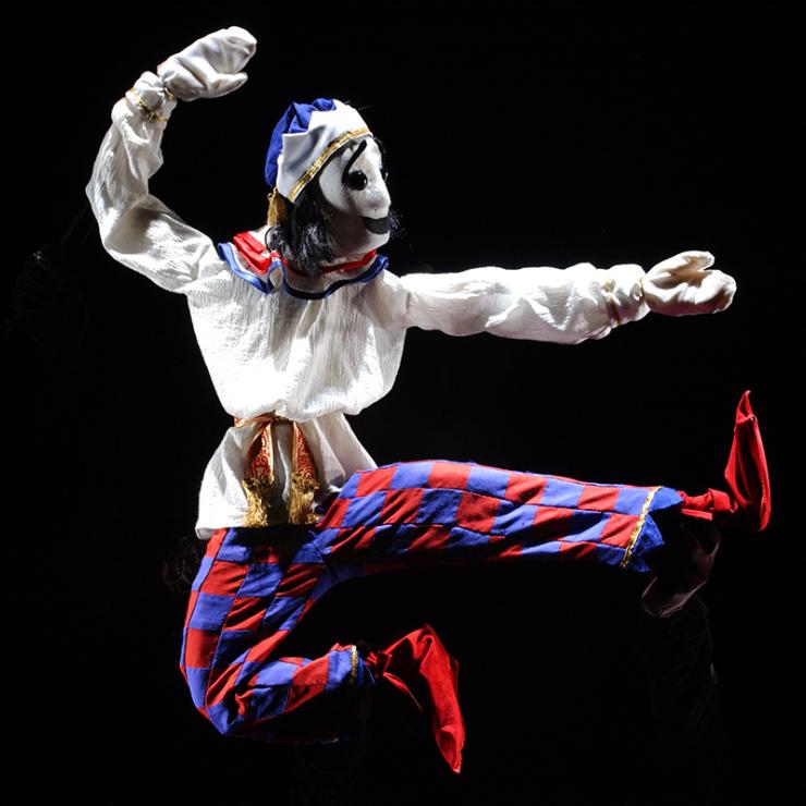 An artist performs as a clown in an ArtsEmerson show.