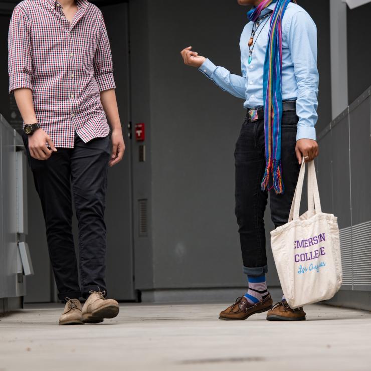 Students talking and walking through Emerson Los Angeles facility