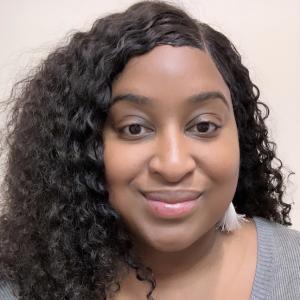 Picture of black woman with long curly hair