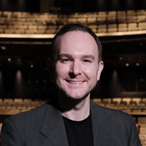 Eric Cornell in a theatre