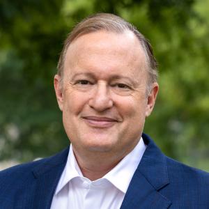 Headshot photo of President Jay Bernhardt, Emerson College