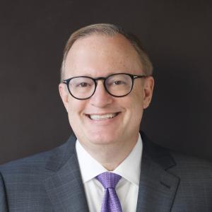 Headshot photo of President Jay Bernhardt, Emerson College
