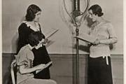 3 women reading a text