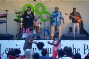 Band playing instruments on stage