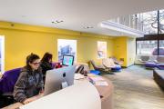Students working at the Visitors' Center front desk