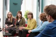 Faculty members in conversation