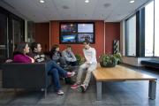 Students sitting together on sofa
