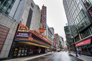 Paramount theatre street-front with pedestrians walking