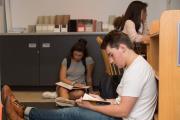 Student reading a book