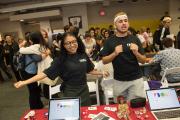 E.B.O.N.I. student organization representatives dancing during the Fall Organization Fair