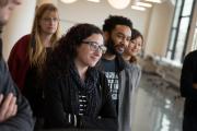 Group of students listening to a speaker