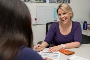 A faculty member helping a student make decisions