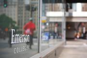 Close up shot of Emerson College logo on glass panel