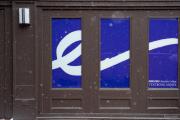 Emerson College logo on Textbook Annex building
