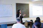 Person teaching in front of class