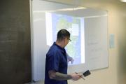 An EPI student presenting in class at MCI Concord (Photo courtesy of MA DOC)