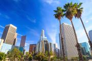 An upward angled view of the Los Angeles skyline