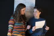 Two students brainstorming for a project.