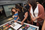 Students looking at projects during an Engagement Lab event