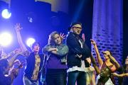 Students performing on stage