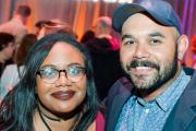 Two young alumni at a regional event
