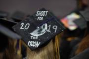 Graduating student with a decorated cap