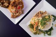 Two plates side-by-side with food