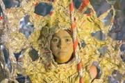 Depiction of a woman in gold, from a previous Emerson Contemporary exhibition