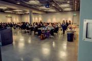 large group of people sitting in the assembly room at Emerson Los Angeles