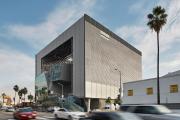 exterior of Emerson Los Angeles building with cars in the foreground