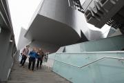 Three students walking down the stairs together at Emerson Los Angeles
