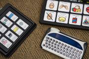 communication and speech tools including keyboard on table