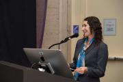 Person giving a lecture at a podium