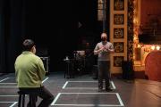 Two people standing on a stage