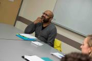 Writing, Literature & Publishing faculty at a table