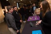 People meeting at a Sports Communication event