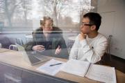 Two students sitting and talking