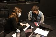 Two people sitting at the career fair